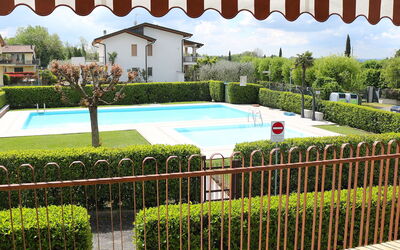 Lazise 718: Shrub, Swimming Pool, Hedge, Shade, Garden, Lawn, Landscaping, Hacienda, Resort, Yard
