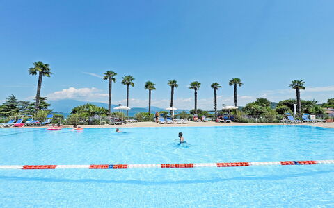 Manerba 641: Water, Sky, Swimming Pool, Tree, Coastal And Oceanic Landforms, Outdoor Recreation, Leisure, Arecales, Recreation, Palm Tree