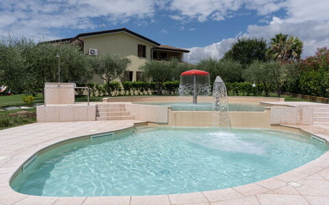 Moniga del Garda 653: Water, Cloud, Sky, Property, Swimming Pool, Azure, Leisure, Composite Material, Tree, Residential Area