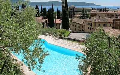 Toscolano 608: Water, Sky, Plant, Property, Building, Azure, Tree, Natural Landscape, Body Of Water, Swimming Pool