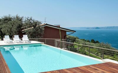Torri del Benaco 639: Swimming Pool, Property, House, Azure, Real Estate, Deck, Building, Vacation, Roof, Home