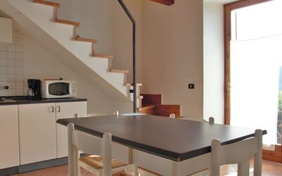 Ca' Pignoi 625.4: Property, Furniture, Cabinetry, Table, Building, Wood, Kitchen, Countertop, Gas Stove, Interior Design