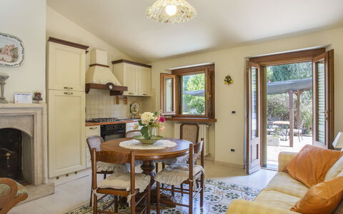 L'Amorosa: Property, Furniture, Table, Plant, Wood, Interior Design, Living Room, Chair, Floor, Flooring