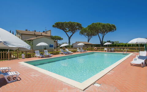 Cecina 609: Water, Sky, Plant, Swimming Pool, Azure, Tree, Umbrella, Shade, Outdoor Furniture, Building