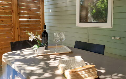 Marina di Bibbona 618: Table, Plant, Building, Furniture, Wood, Tree, Shade, Lighting, Interior Design, Window