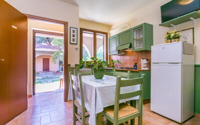 Trilocale - Ranch Hotel 614.3: Cabinetry, Furniture, Countertop, Property, Table, Plant, Chair, Houseplant, Kitchen, Wood