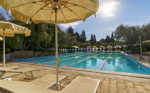 Castiglione della Pescaia 610: Water, Sky, Plant, Building, Umbrella, Cloud, Swimming Pool, Nature, Blue, Tree