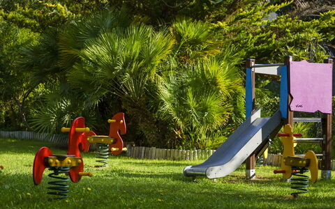 Castiglione della Pescaia 610: Plant, Green, Playground Slide, Chute, Tree, Grass, Leisure, Recreation, Playground, Shade