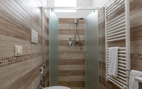 Castagno: Property, Plumbing Fixture, Lighting, Interior Design, Architecture, Wood, Bathroom, Tap, Floor