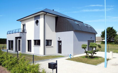 Pirou Beach: Plant, Sky, Property, Window, Cloud, Street Light, Door, Land Lot, Tree, Shade