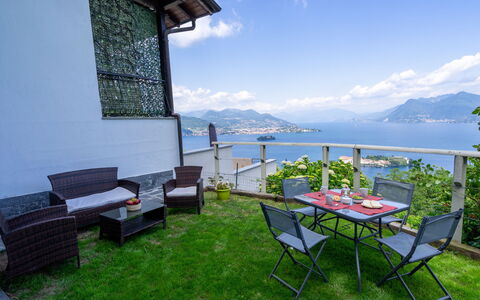 Stresa 613: Property, House, Real Estate, Building, Sky, Vacation, Room, Grass, Table, Furniture