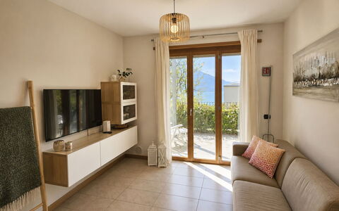 San Vincenzo: Furniture, Interior Design, Flooring, Wall, Wood, Floor, Ceiling, Room, Television, Living Room