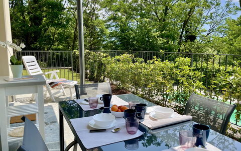 San Vincenzo: Table, Furniture, Tableware, Plant, Chair, Outdoor Furniture, Dishware, Tree, Shade, Interior Design