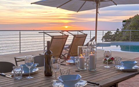 Vistamare: Table, Tableware, Sky, Furniture, Water, Property, Drinkware, Light, Outdoor Table, Chair