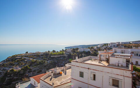 Villa Teresa: Water, Sky, Building, Daytime, Window, Light, Azure, Sunlight, Urban Design, Cloud