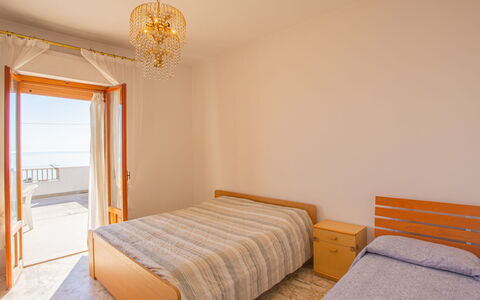 Villa Teresa: Building, Furniture, Comfort, Azure, Wood, Bed Frame, Lighting, Shade, Pillow, Orange