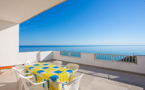 Villa Teresa: Property, Sky, Furniture, Table, Building, Azure, Chair, Shade, Floor, Flooring