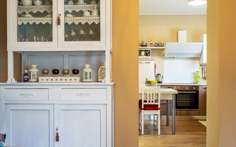 Di Pipot: Room, Furniture, Kitchen, Cabinetry, Property, Interior Design, Countertop, Yellow, Shelf, Building
