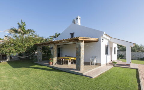 Amado: Sky, Building, Plant, Shade, House, Land Lot, Porch, Tree, Door, Cottage
