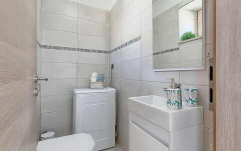 Villa Karmen: Plumbing Fixture, Property, Tap, Bathroom, Toilet Seat, Building, Purple, Toilet, Mirror, House