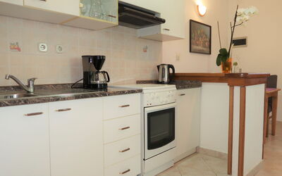 Mirjana 797.1: Cabinetry, Property, Kitchen Sink, Building, Countertop, Picture Frame, Sink, Kitchen Appliance, Kitchen, Kitchen Stove