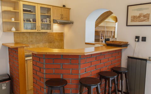 Csonka: Furniture, Wood, Interior Design, Flooring, Bar Stool, Countertop, Wood Stain, Cabinetry, Chair, Kitchen