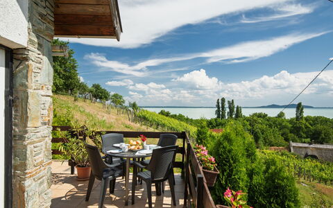 Kopacsi: Furniture, Chair, Outdoor Furniture, Outdoor Table, Shade, Eco Hotel, Kitchen & Dining Room Table, Balcony, Wood Stain, Landscaping