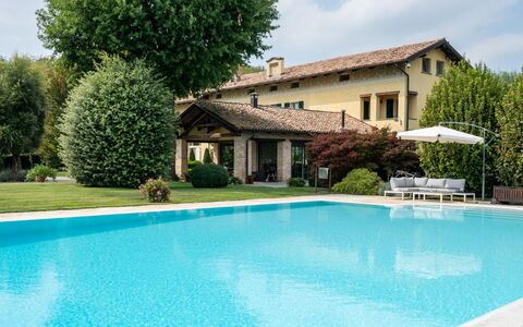 Villa Carlotta: Water, Plant, Building, Property, Sky, Swimming Pool, Azure, Tree, Cloud, House