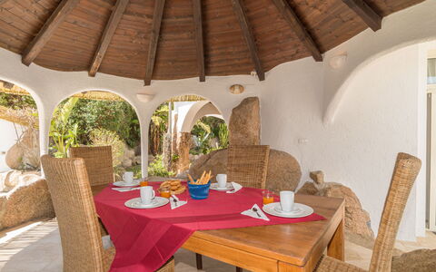 La Dolce Vita: Table, Property, Furniture, Chair, Building, Interior Design, Wood, Outdoor Furniture, Shade, Comfort