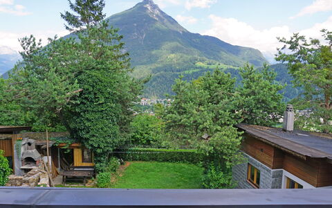 Anich: Cloud, Sky, Plant, Mountain, Property, Building, Ecoregion, Leaf, Natural Landscape, Tree