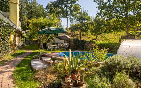 Karasova Iii: Garden, Vegetation, Property, Natural Landscape, Grass, Yard, Botanical Garden, House, Botany, Home