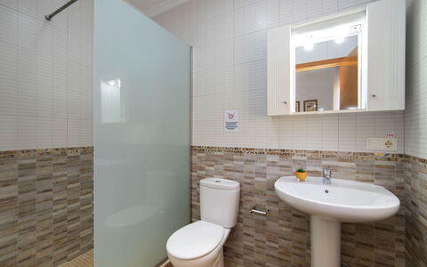 Enrique: Bathroom, Toilet Seat, Plumbing Fixture, Bathroom Sink, Wall, Flooring, Toilet, Floor, Sink, Plumbing