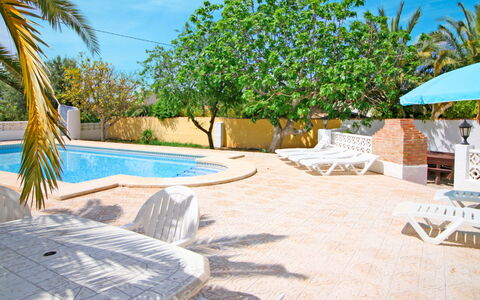 Marfilena: Sky, Plant, Property, Azure, Water, Shade, Arecales, Outdoor Furniture, Swimming Pool, Leisure