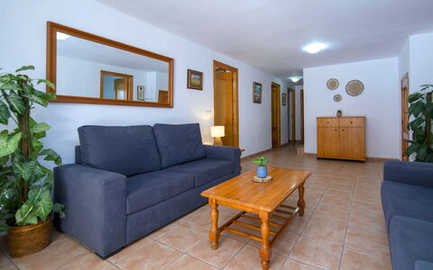 Villa Maria: Flooring, Furniture, Floor, Ceiling, Couch, Hardwood, Wood Stain, Houseplant, Living Room
