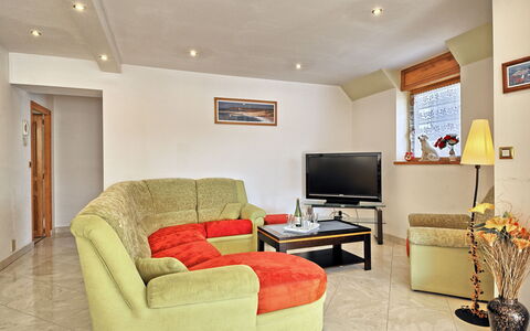 Ty Ker: Furniture, Property, Picture Frame, Comfort, Interior Design, Couch, Lighting, Living Room, Wood, Flooring
