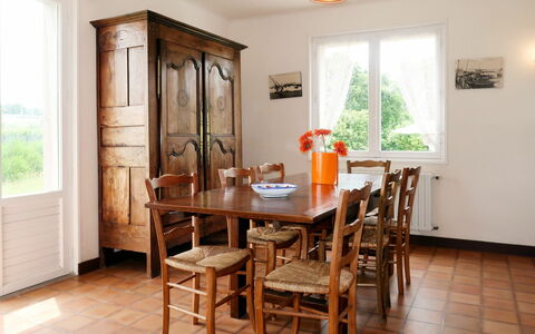 Les Genêts: Table, Furniture, Property, Window, Wood, Plant, Chair, Houseplant, Interior Design