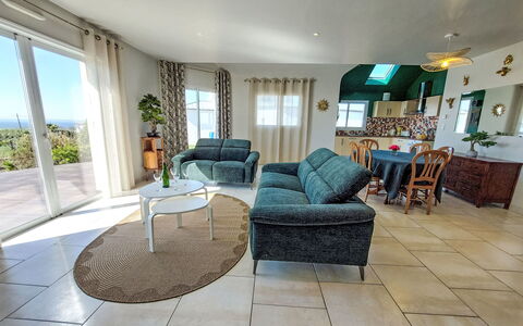 Cassiopée: Furniture, Flooring, Interior Design, Floor, Couch, Table, Ceiling, Lighting, Chair, Living Room