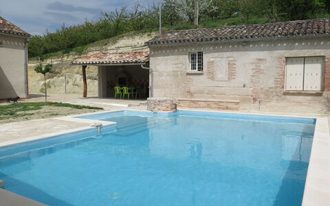 Touzy: Water, Cloud, Sky, Property, Swimming Pool, Plant, Building, Azure, Shade, Rectangle