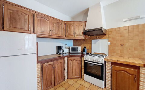 La Bergerie de Durand: Kitchen, Countertop, Cabinetry, Major Appliance, Flooring, Kitchen Appliance, Wood, Interior Design, Furniture, Floor