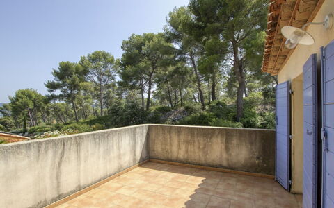 Le Puit des Oliviers i: Sky, Tree, Road Surface, Plant, Land Lot, Building, Wood, Shade, Composite Material, Landscape