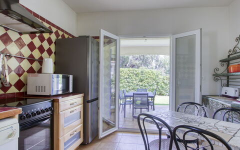 Le Puit des Oliviers i: Cabinetry, Kitchen, Building, Wood, Interior Design, Countertop, Floor, Flooring, Chair, Drawer