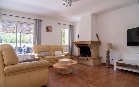 Les Restanques: Furniture, Property, Window, Couch, Wood, Lighting, Interior Design, Ceiling Fan, Living Room, Floor