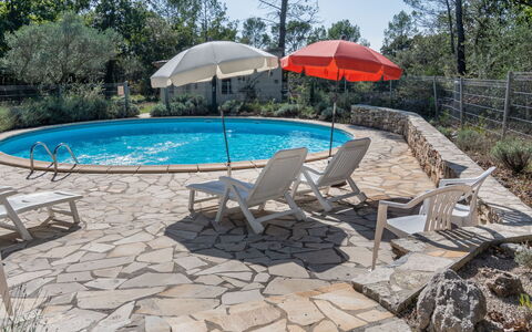 Carpanel: Water, Plant, Property, Tree, Swimming Pool, Shade, Umbrella, Outdoor Furniture, Chair, Leisure