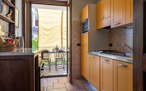 I Briganti: Cabinetry, Property, Countertop, Furniture, Interior Design, Wood, Kitchen Appliance, Kitchen, Kitchen Sink, Building
