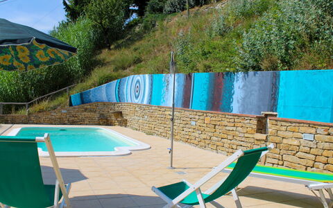 La Rovere: Property, Swimming Pool, Leisure, Furniture, Sunlounger, Outdoor Furniture, House, Turquoise, Wall, Backyard