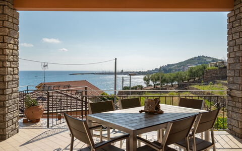 Irma: Water, Table, Sky, Furniture, Chair, Cloud, Azure, Wood, Plant, Interior Design