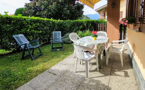Parco Musadino: Plant, Furniture, Building, Table, Chair, Outdoor Table, Houseplant, Outdoor Furniture, Shade, Flowerpot