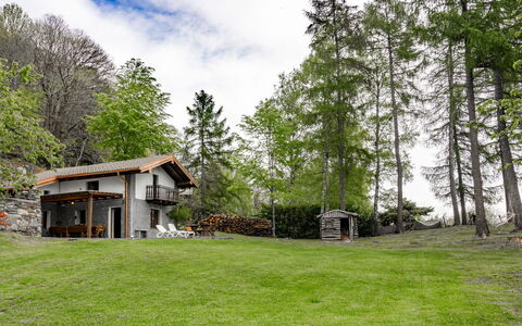 Baita Nini: Plant, Cloud, Building, Sky, Natural Landscape, Tree, Land Lot, House, Grass, Landscape