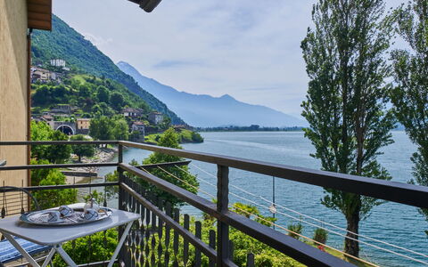 Punto Lago: Sky, Water, Plant, Property, Cloud, Nature, Mountain, Building, Fence, Porch
