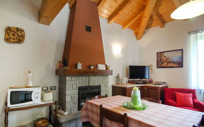 Ghiano 610.3: Furniture, Property, Table, Building, Wood, Orange, Interior Design, Home Appliance, Living Room, Flooring